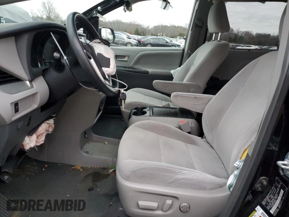 2015 Toyota Sienna LE AAS with VIN 5TDKK3DC4FS676241, listed as a Copart auction lot 83759014 with 133,659 mi miles and Salvage Title. Bid and sale history available at DreamBid. Image 7.