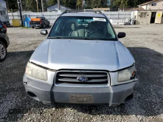 2003 Subaru Forester X with VIN JF1SG63643H727564, listed as a Copart auction lot 77736064 with 167,293 mi miles and Salvage Title. Bid and sale history available at carsss.com. Image 5.