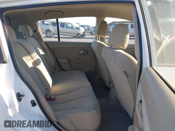 2009 Nissan Versa S with VIN 3N1BC13E99L436717, listed as a IAAI auction lot 42201306 with 51,460 mi miles and . Bid and sale history available at carsss.com. Image 8.