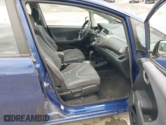 2009 Honda Fit with VIN JHMGE882X9S058976, listed as a IAAI auction lot 42202305 with 121,633 mi miles and . Bid and sale history available at DreamBid. Image 5.