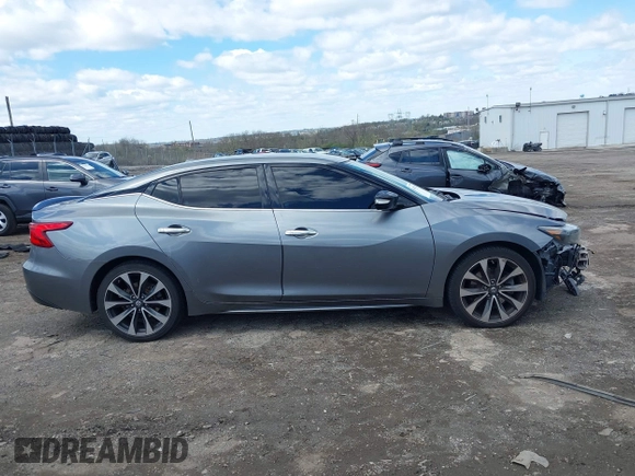 2016 Nissan Maxima SL with VIN 1N4AA6AP8GC385175, listed as a IAAI auction lot 41987763 with 117,485 mi miles and . Bid and sale history available at DreamBid. Image 13.