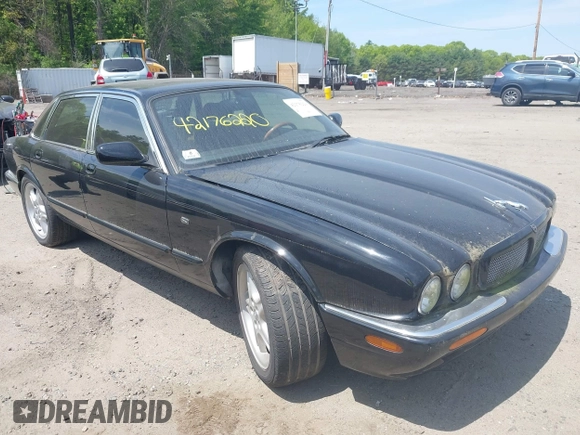 1999 Jaguar XJ with VIN SAJPX1841XC864072, listed as a IAAI auction lot 42176220 with 122,712 mi miles and . Bid and sale history available at DreamBid. Image 1.