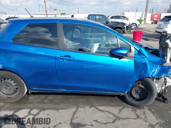 2015 Toyota Yaris L with VIN VNKJTUD3XFA020368, listed as a IAAI auction lot 41555073 with 122,552 mi miles and . Bid and sale history available at carsss.com. Image 14.