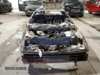 1986 Pontiac Fiero z VIN 1G2PE37R7GP274467, wystawiony jako Copart lot #44980195 z przebiegiem Nie podano mil oraz Szkody całkowita. Historia ofert i sprzedaży dostępna na DreamBid. Obrazek 5.