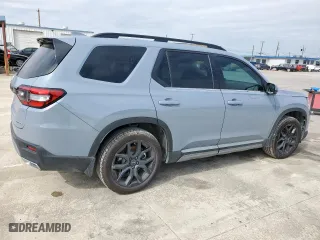 2025 Honda Pilot Touring with VIN 5FNYG2H78SB000571, listed as a Copart auction lot 45391595 with 6,916 mi miles and Salvage Title. Bid and sale history available at carsss.com. Image 3.
