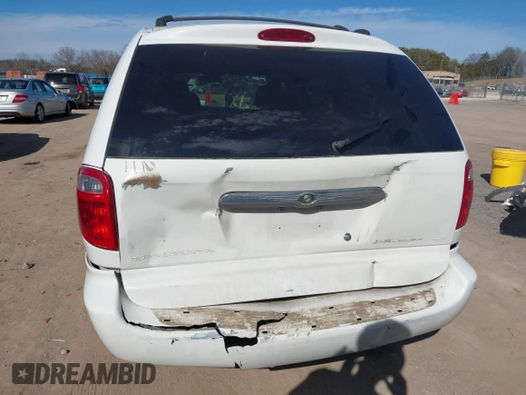 2003 Chrysler Town & Country LX with VIN 2C4GP44L33R117314, listed as a IAAI auction lot 41674437 with Not Provided miles and . Bid and sale history available at DreamBid. Image 6.