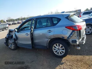 2014 Mazda CX-5 Sport with VIN JM3KE2BE9E0330345, listed as a IAAI auction lot 41377335 with 103,340 mi miles and . Bid and sale history available at carsss.com. Image 14.