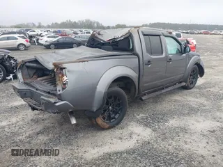2021 Nissan Frontier SV z VIN 1N6ED0EA6MN713258, wystawiony jako IAAI lot #40820539 z przebiegiem 86 364 mil mil oraz . Historia ofert i sprzedaży dostępna na DreamBid. Obrazek 4.
