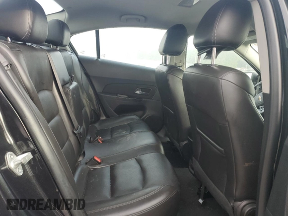 2014 Chevrolet Cruze 2LT z VIN 1G1PE5SB5E7335600, wystawiony jako Copart lot #52023225 z przebiegiem Nie podano mil oraz Szkoda całkowita • Salvage title. Historia ofert i sprzedaży dostępna na DreamBid. Obrazek 10.