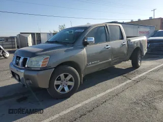 2006 Nissan Titan SE z VIN 1N6BA07B76N565304, wystawiony jako Copart lot #53161945 z przebiegiem 129 220 mil mil oraz Szkoda całkowita • Salvage title. Historia ofert i sprzedaży dostępna na DreamBid. Obrazek 1.