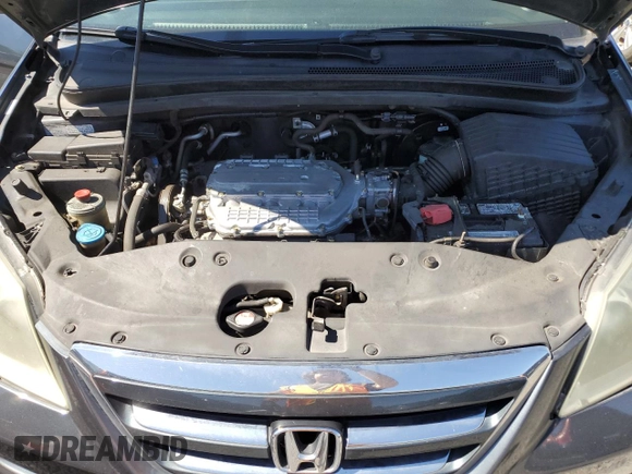 2005 Honda Odyssey EX with VIN 5FNRL38415B009502, listed as a Copart auction lot 53872455 with 205,051 mi miles and Salvage title. Bid and sale history available at DreamBid. Image 12.