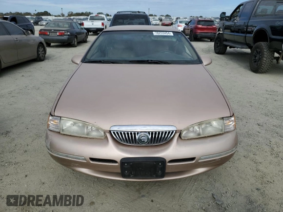 1996 Mercury Cougar z VIN 1MELM62W3TH600523, wystawiony jako Copart lot #78253454 z przebiegiem 84 531 mil mil oraz Tytuł czysty. Historia ofert i sprzedaży dostępna na DreamBid. Obrazek 5.