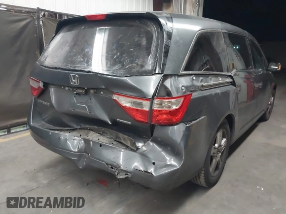 2012 Honda Odyssey Touring с VIN 5FNRL5H99CB047340, выставлен на аукционе IAAI как лот 41965189 с пробегом Не указан миль и . История ставок и продаж доступна на DreamBid. Изображение 6.