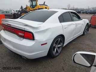 2013 Dodge Charger RT Plus with VIN 2C3CDXCT8DH660566, listed as a IAAI auction lot 40865076 with 113,417 mi miles. Bid and sale history available at carsss.com. Image 4.
