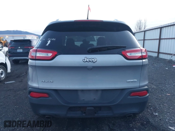 2014 Jeep Cherokee Latitude with VIN 1C4PJMCSXEW220556, listed as a IAAI auction lot 41060501 with 70,152 mi miles and . Bid and sale history available at carsss.com. Image 16.