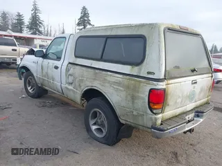 2000 Mazda B-Series 2WD Truck SX with VIN 4F4YR12C4YTM29858, listed as a IAAI auction lot 41473810 with 261,518 mi miles. Bid and sale history available at carsss.com. Image 3.