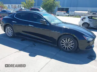 2014 Maserati Ghibli z VIN ZAM57XSA5E1091490, wystawiony jako IAAI lot #41848480 z przebiegiem 129 585 mil mil oraz . Historia ofert i sprzedaży dostępna na DreamBid. Obrazek 1.