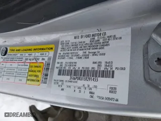 2014 Ford Fusion Titanium Hybrid with VIN 3FA6P0RU1ER291455, listed as a IAAI auction lot 41821152 with 108,408 mi miles. Bid and sale history available at carsss.com. Image 9.