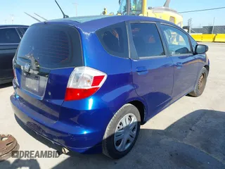 2009 Honda Fit with VIN JHMGE88279S071667, listed as a IAAI auction lot 42035664 with 235,791 mi miles. Bid and sale history available at carsss.com. Image 4.