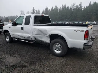 2003 Ford Super Duty F-250 XL with VIN 1FTNX21L63EC71321, listed as a Copart auction lot 83450654 with 112,486 mi miles and Salvage Title. Bid and sale history available at carsss.com. Image 2.