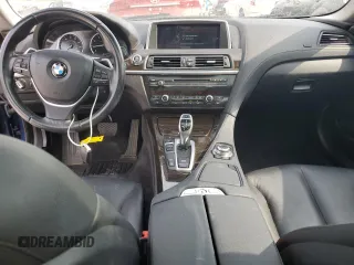 2014 BMW 6 Series z VIN WBALY1C59EDZ73460, wystawiony jako Copart lot #64846204 z przebiegiem 58 876 mil mil oraz Czysty tytuł • Clean title. Historia ofert i sprzedaży dostępna na DreamBid. Obrazek 8.