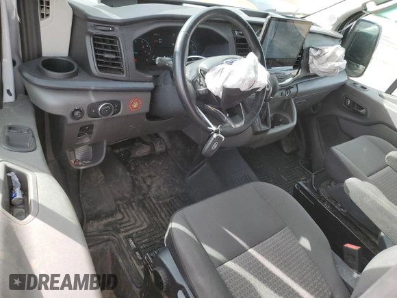 2023 Ford Transit Cargo with VIN 1FTBW2XG9PKB73049, listed as a Copart auction lot 50264605 with 103,021 mi miles and Salvage title. Bid and sale history available at DreamBid. Image 8.