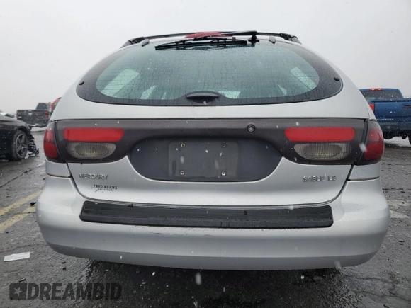 2004 Mercury Sable LS Premium with VIN 1MEHM59S54A605655, listed as a Copart auction lot 82005284 with 101,723 mi miles and Salvage Title. Bid and sale history available at DreamBid. Image 6.