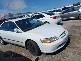 1999 Honda Accord LX z VIN JHMCG5645XC018789, wystawiony jako IAAI lot #42458182 z przebiegiem 176 792 mil mil oraz . Historia ofert i sprzedaży dostępna na DreamBid. Obrazek 1.
