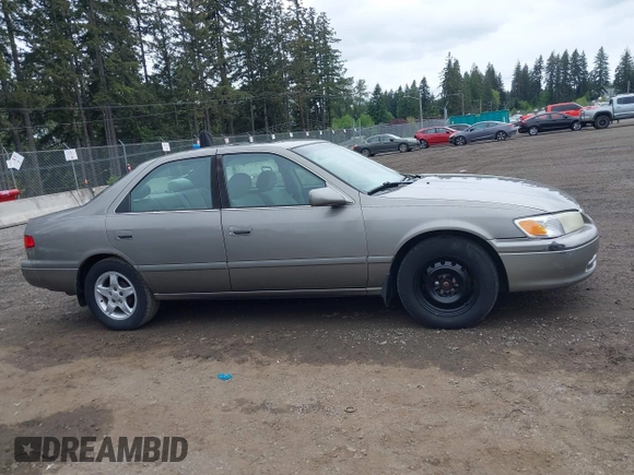 2001 Toyota Camry CE z VIN 4T1BG22K31U097733, wystawiony jako IAAI lot #42276687 z przebiegiem 180 357 mil mil oraz . Historia ofert i sprzedaży dostępna na DreamBid. Obrazek 13.