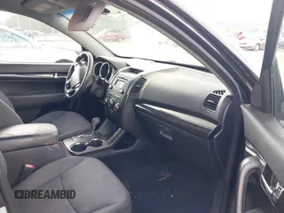 2013 Kia Sorento LX with VIN 5XYKTDA68DG408823, listed as a IAAI auction lot 42554361 with 221,917 mi miles and . Bid and sale history available at DreamBid. Image 5.