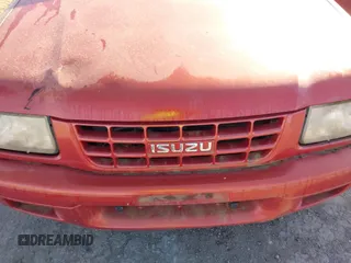 1999 Isuzu Rodeo S with VIN 4S2CM58W6X4336332, listed as a IAAI auction lot 41758338 with 183,983 mi miles. Bid and sale history available at carsss.com. Image 6.