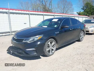 2019 Kia Optima LX with VIN 5XXGT4L31KG353576, listed as a IAAI auction lot 41712207 with 113,986 mi miles. Bid and sale history available at carsss.com. Image 2.