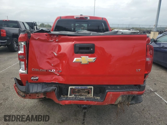 2020 Chevrolet Colorado 4WD LT with VIN 1GCGTCEN3L1205113, listed as a Copart auction lot 73558044 with 61,406 mi miles and Salvage title. Bid and sale history available at DreamBid. Image 6.