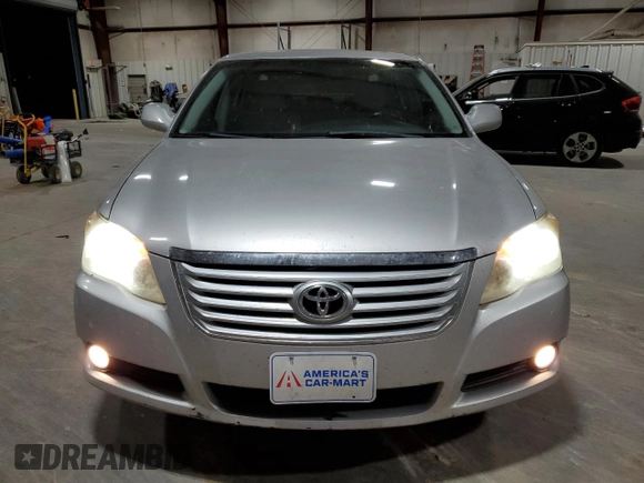 2009 Toyota Avalon XL with VIN 4T1BK36B69U348772, listed as a Copart auction lot 84166684 with 143,349 mi miles and Salvage Title. Bid and sale history available at carsss.com. Image 5.