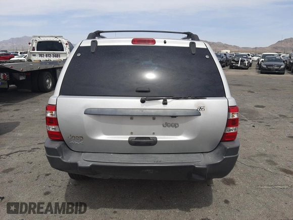 2004 Jeep Grand Cherokee Laredo with VIN 1J4GW48S34C339876, listed as a Copart auction lot 52428045 with 229,606 mi miles and Salvage Title. Bid and sale history available at carsss.com. Image 6.