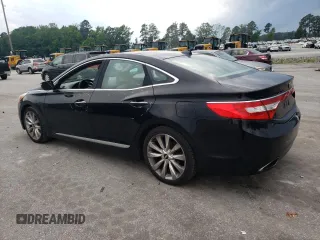 2013 Hyundai Azera with VIN KMHFH4JGXDA198345, listed as a Copart auction lot 58256945 with 102,711 mi miles and Salvage title. Bid and sale history available at DreamBid. Image 2.