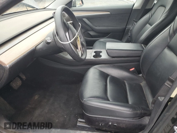 2021 Tesla Model 3 Standard Range Plus with VIN 5YJ3E1EA2MF087879, listed as a Copart auction lot 51853235 with 65,477 mi miles and Non Repairable. Bid and sale history available at carsss.com. Image 7.
