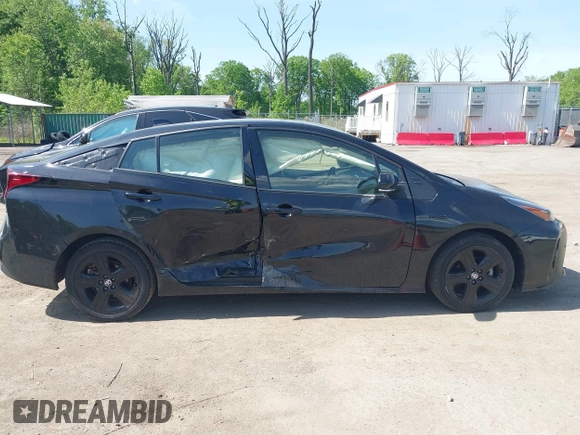 2022 Toyota Prius L Eco with VIN JTDKAMFU0N3175619, listed as a IAAI auction lot 42098135 with 72,984 mi miles and . Bid and sale history available at DreamBid. Image 13.