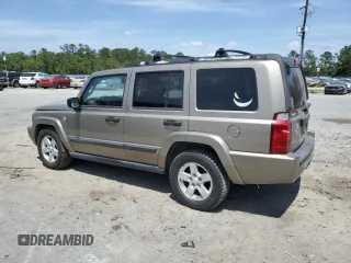 2006 Jeep Commander with VIN 1J8HG48N06C274675, listed as a Copart auction lot 54521835 with 134,587 mi miles and Salvage Title. Bid and sale history available at DreamBid. Image 2.