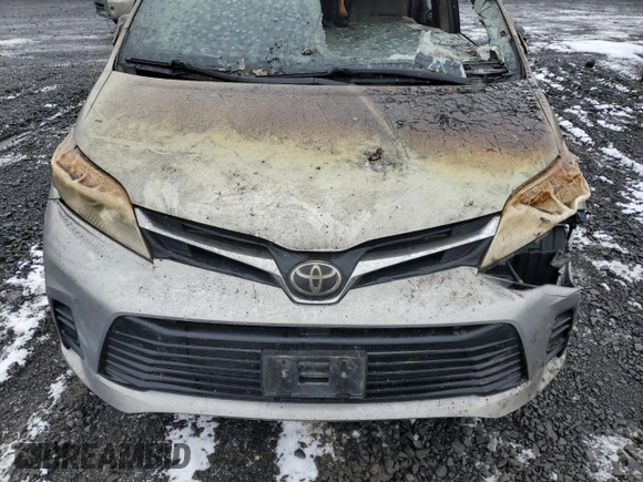 2018 Toyota Sienna LE с VIN 5TDJZ3DC5JS190506, выставлен на аукционе Copart как лот 86137964 с пробегом Не указан миль и Списание • Salvage title. История ставок и продаж доступна на DreamBid. Изображение 13.