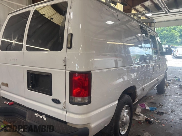 2013 Ford Econoline Cargo Commercial with VIN 1FTNE2EL5DDB27606, listed as a IAAI auction lot 42734078 with 122,369 mi miles and . Bid and sale history available at DreamBid. Image 22.