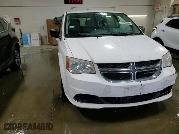 2014 Dodge Grand Caravan SE with VIN 2C4RDGBG6ER230346, listed as a Copart auction lot 50982295 with 173,576 mi miles and Salvage Title. Bid and sale history available at DreamBid. Image 14.