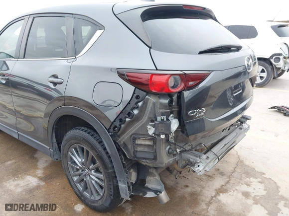 2021 Mazda CX-5 Touring with VIN JM3KFBCM0M0342210, listed as a IAAI auction lot 41236013 with 96,012 mi miles. Bid and sale history available at carsss.com. Image 18.
