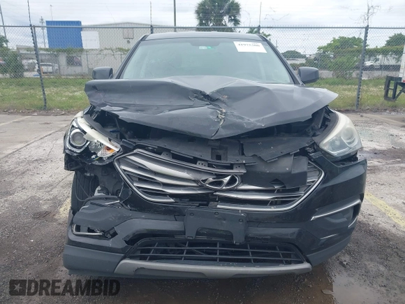 2018 Hyundai Santa Fe 2.4L with VIN 5XYZT3LB5JG539917, listed as a IAAI auction lot 41975300 with 214,562 mi miles and . Bid and sale history available at DreamBid. Image 12.