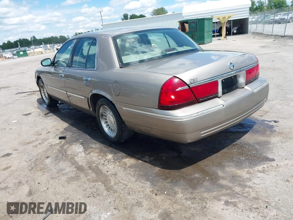 2001 Mercury Grand Marquis LS z VIN 2MEFM75W31X704182, wystawiony jako IAAI lot #42086175 z przebiegiem 177 892 mil mil oraz . Historia ofert i sprzedaży dostępna na DreamBid. Obrazek 3.