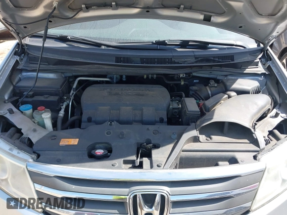 2012 Honda Odyssey Touring with VIN 5FNRL5H92CB108690, listed as a IAAI auction lot 41826580 with 150,327 mi miles and . Bid and sale history available at DreamBid. Image 10.