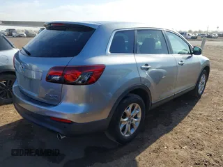 2015 Mazda CX-9 Touring with VIN JM3TB3CA7F0451472, listed as a IAAI auction lot 41559364 with 126,797 mi miles. Bid and sale history available at carsss.com. Image 4.