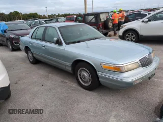 1996 Mercury Grand Marquis GS with VIN 2MELM74W5TX653873, listed as a Copart auction lot 74659254 with 86,589 mi miles and Salvage Title. Bid and sale history available at DreamBid. Image 4.
