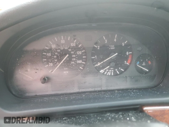 1999 BMW 5 Series 528iA with VIN WBADM6332XBY30585, listed as a Copart auction lot 74830704 with 0 mi miles and Salvage Title. Bid and sale history available at carsss.com. Image 9.