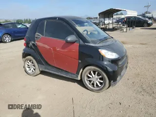 2014 Smart fortwo Pure z VIN WMEEJ3BA1EK753320, wystawiony jako Copart lot #55665555 z przebiegiem 71 305 mil mil oraz Szkody całkowita. Historia ofert i sprzedaży dostępna na DreamBid. Obrazek 4.